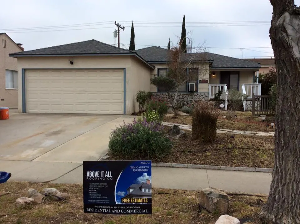 Completed project with Above All Roofing sign