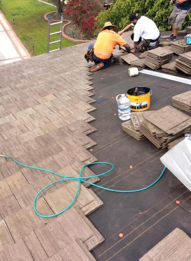 Roof materials being installed